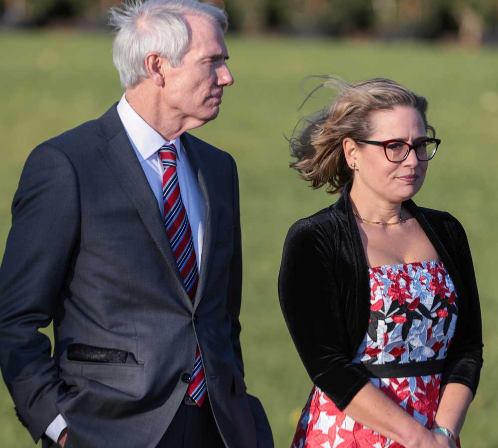 Sen. Rob Portman, R-Ohio and Sen. Kyrsten Sinema, D-Ariz.